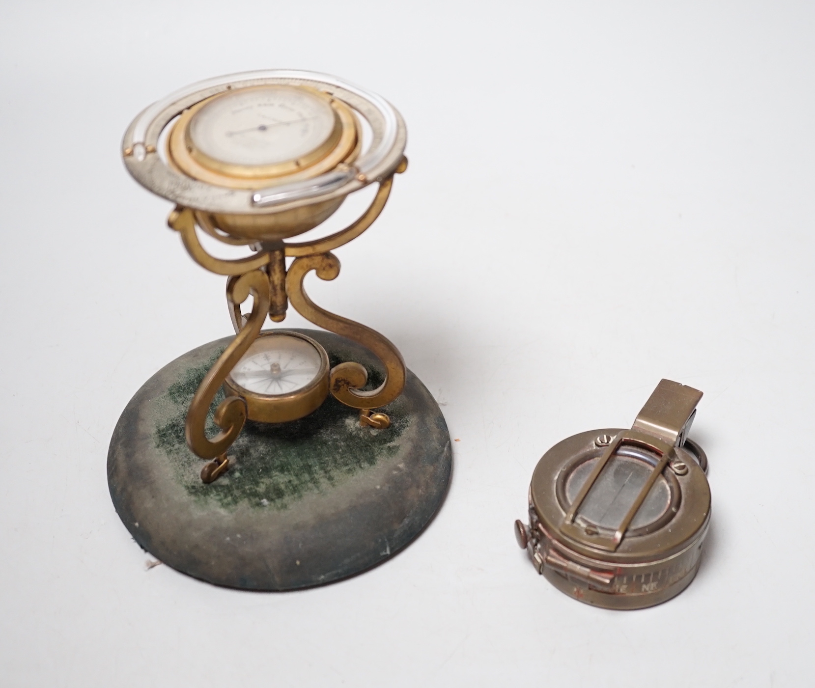 A Victorian Callaghan patent 'globe', desk barometer, thermometer and compass, 14cm high and a Sestrel compass